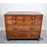 A Regency mahogany chest of two short and three long graduated drawers, with split bobbin mounts,