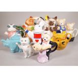 A quantity of 20th century novelty tea pots formed as various animals, the largest 23cm high,