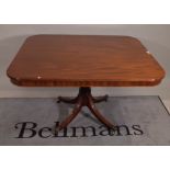 A Regency mahogany breakfast table, the rounded rectangular snap top on four downswept supports,