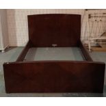 A modern hardwood double bed with diamond shaped inlaid headboard, 163cm wide x 110cm high.