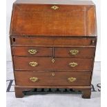 A George III oak bureau with welled interior over two short and two long drawers on bracket feet,