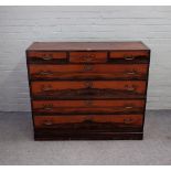 A Japanese softwood and hardwood dansu chest, of three short over four long drawers,