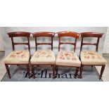 A set of four 19th century mahogany framed bar back dining chairs, on octagonal turned supports,