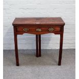 A mid-18th century mahogany tea table with double gate leg action, on canted square supports,