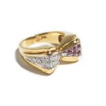 An 18ct gold, diamond and ruby ring, designed as a stylized bow,