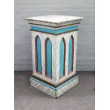 A Gothic revival polychrome painted faux marble pedestal with arch moulded sides on stepped base,