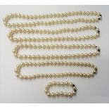 Four single row necklaces of graduated cultured pearls and one single row bracelet,