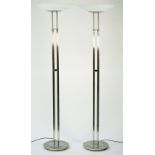A pair of modern chrome uplighters of square tubular form with frosted glass dished shades,
