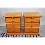 A pair of 20th century pine bedside chests,