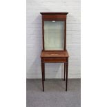 An Edwardian marquetry inlaid mahogany display cabinet on stand,