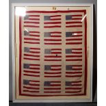 A textile panel 'American flag', framed and glazed, 94 cm x 76 cm overall.