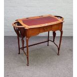 A late 19th century mahogany writing desk, the serpentine top flanked by semi-elliptic jardinieres,