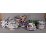 An Old Chelsea blue and white part dinner service, including a lidded tureen, cup and saucers,