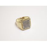 A 9ct gold and diamond set gentleman's rectangular signet style ring,