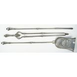 A set of three Victorian steel fire tools, with octagonal tapering handles and knopped shafts,