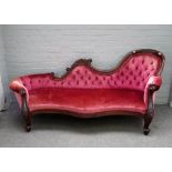 A Victorian mahogany framed double spoon back chaise longue,