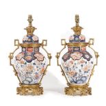 A pair of ormolu mounted Samson porcelain vases and covers (converted to table lamps),