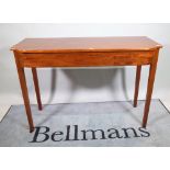 A late George III style mahogany single drawer serving table, on tapering square supports,