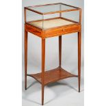 A Regency boxwood strung mahogany bijouterie table,