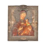 A Russian Icon, All-Hymed Mother of God, polychrome painted with white metal oklad, 44cm x 38cm.