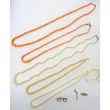 A single row necklace of graduated coral beads, on a snap clasp,