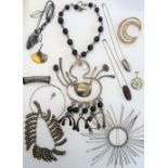 A group of mostly modern studio jewellery, comprising; a circular hair ornament,