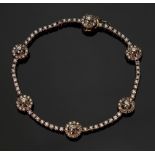 A diamond-set bracelet, set with six dia