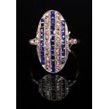 An 18ct sapphire and diamond-set plaque