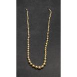 A single row graduated cultured pearl ne