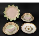 A pair of English tea bowls and saucers