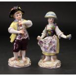 A pair of Meissen figures of vintners, 2