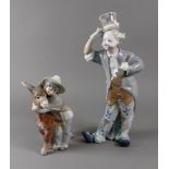 A Lladro figure of a clown musician, with violin, 01001126, 35cm high and a Lladro boy with donkey,
