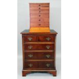 A reproduction George III style mahogany chest of four drawers, 61,