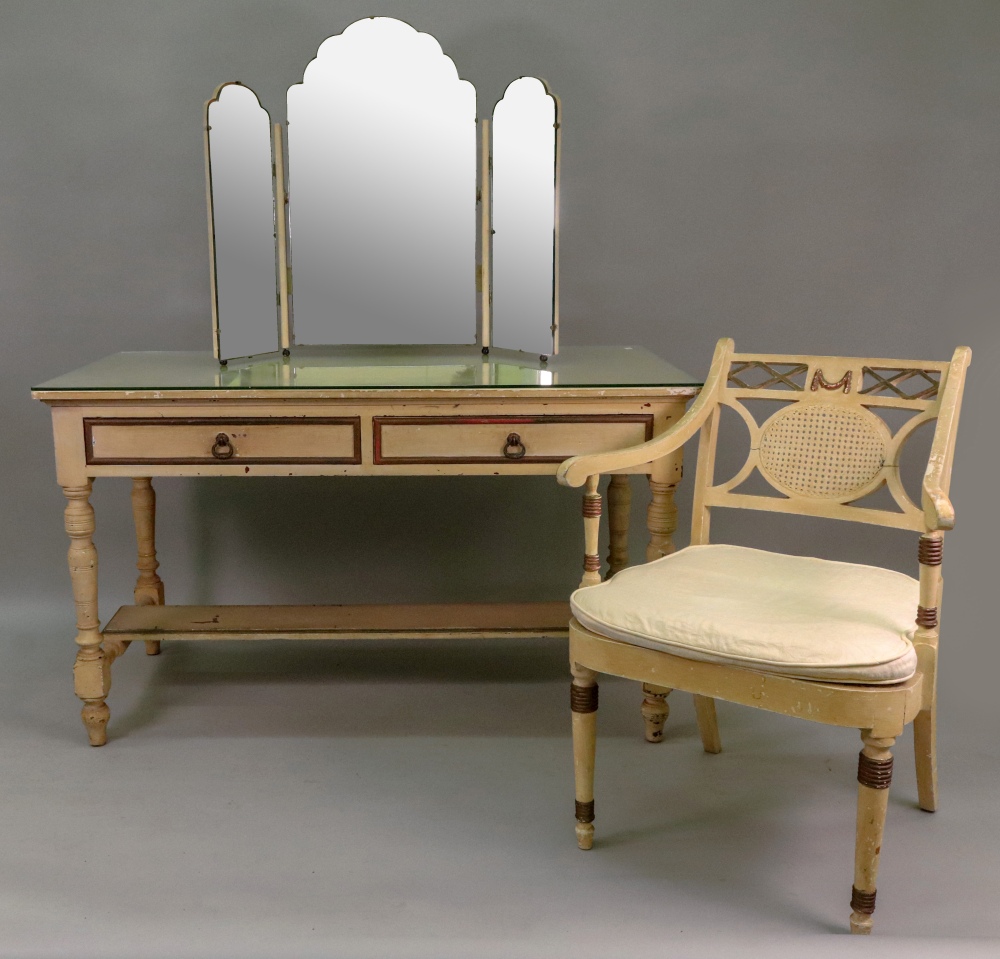 A pair of cream and gilt painted bedside tables, in George III style,