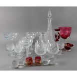 A harlequin set of seven cut pattern drinking glasses, in Regency style, 10cm high,