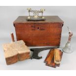 A rectangular oak chest, early 19th century, with hinged top and iron carrying handles,