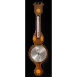 Onorato Comitti: a reproduction George III style mahogany barber pole strung and inlaid wheel