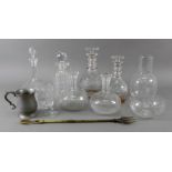 A graduated pair of George III style cut glass decanters, 24 & 21cm high,
