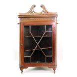 A 'Chippendale Revival' mahogany blind cut-card carved wall hanging corner cabinet,