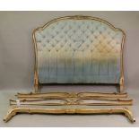 A Louis XV style cream and gilt painted frame double bed, foliate and shell carved,