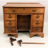 A George III style mahogany kneehole desk,