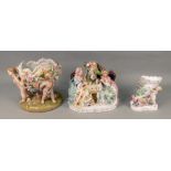 A continental porcelain figure group taking tea, circa 1900, 21cm wide,