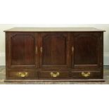 A reproduction George III style oak dwarf cupboard,