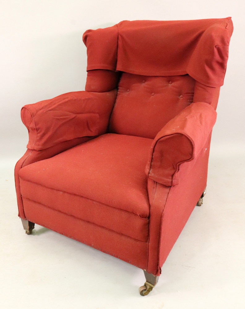 An Edwardian wing back armchair, in George III style, button down upholstered in red material, - Image 2 of 2