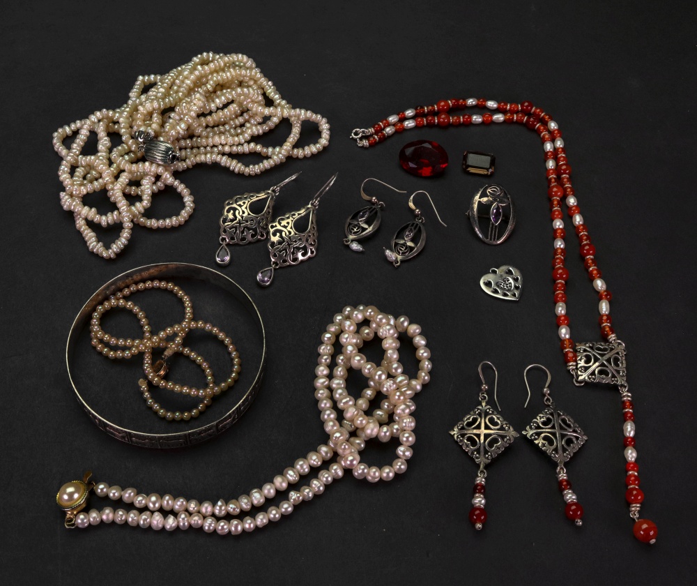 A collection of silver and costume jewel