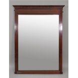 An Edwardian mahogany boxwood strung overmantel mirror, with dentil cornice, 90cm wide x 120cm high,