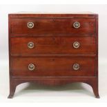 A George III mahogany boxwood and ebony banded chest, fitted with three long drawers,