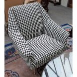Retro design, a pair of 20th century black and white hounds tooth upholstered easy armchairs,