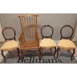 A 20th century stained beech open armchair, 53cm wide x 111cm high,
