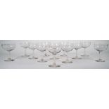 A set of twelve champagne glasses, each with opaque twist stem, 11.5cm. high, (12).